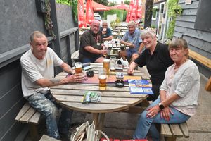 Nigel Fisher, Tracey Mazan and Tracey Robinson are among those enjoying a beer at the Joiners