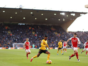 Nelson Semedo of Wolves passes the ball past Declan Rice during the  (Photo by Naomi Baker/Getty Images)