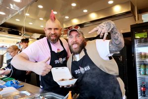 TikTok sensation Ben Newman, 40, serving jacket potatoes with US singer Teddy Swims from his van in Tamworth, Staffs.  