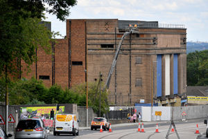 Workmen begin to dismantle the roof of Dudley Hippodrome
