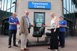 The new buggy at Royal Shrewsbury Hospital. From left to right: Volunteer Andrew Tavernor, LoF Chair Iain Gilmour, CEO Jo Williams and volunteer Claire Ashton