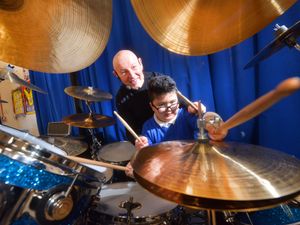 Supporting image for story: Tipton school pupils enjoy masterclass from Status Quo drummer
