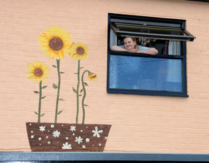 Alana also painted some sunflowers on the wall at the rear of the house