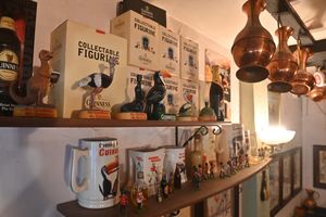 The pub has a lot of distinctive items on the wall, including plenty of commemorative tankards