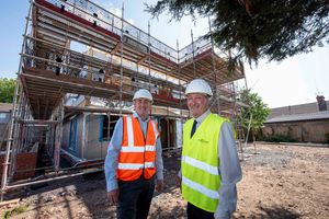 Gavin Ward - Morro Homes (left) - showing Councillor Steve Evans, deputy leader and cabinet member for city housing, (left) the first timber frames for the new council homes at the Old Fallings Crescent development in Wolverhampton