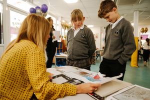 A local artist attended the careers fair and showed pupils their work.