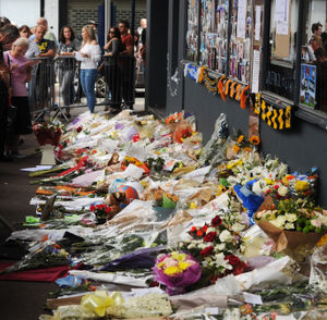Flowers left in tribute to Mr Passey outside Chicago's