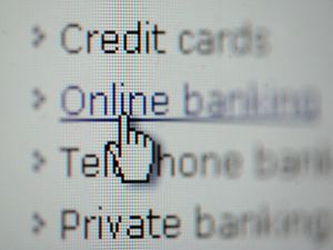 Close-up of a web page, with the pointing over the word 'online banking'