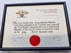 The certificate tells how Craig Thomas has been admitted to the Company of Butchers