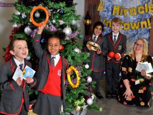 Supporting image for story: Talented pupils make charity CD