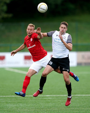Larne's Andrew Mitchell (left) and Bala's David Edwards battle for the ball during the UEFA Europa Conference League first qualifying round, first leg match at Park Hall, Oswestry. Picture date: Thursday July 8, 2021..