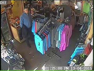 One of the CCTV images released by Penn Golf Club of the suspected thief who had a black coat hanging on his arm