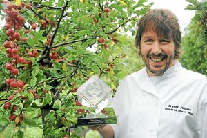 Stuart Phillips, from the Hundred House Hotel, at Norton, near Bridgnorth, celebrates winning the UK Pub Garden of the Year Award from LateRooms.com . 
