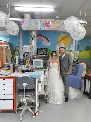 Amie and Shane Elley at the hospital on their wedding day