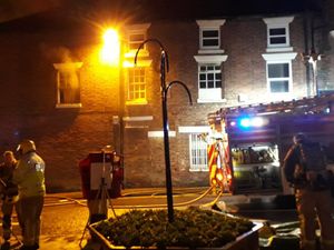 Supporting image for story: Man jumps from window in high street flat fire