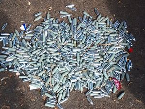 Supporting image for story: Dumped: Hundreds of nitrous oxide capsules found in Newport park
