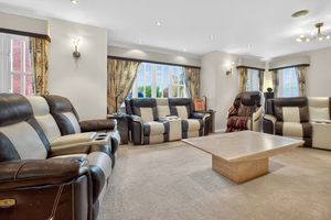 A spacious lounge and dining setup creates the perfect backdrop for both relaxed evenings and entertaining