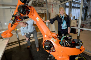 Georgina Barnard and Dave Morris with one of the institute's robots