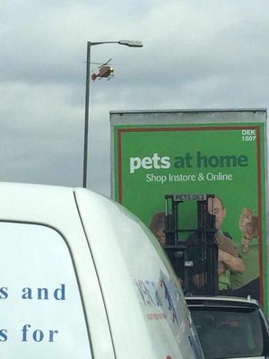 An air ambulance attends the scene, picture: David Callaghan