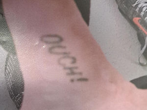 Supporting image for story: Cocaine dealer identified by distinctive tattoo jailed for 13 years