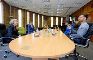 Former PM Theresa May chats to former homeless guys Dave Armishaw and Imran Reece Wall