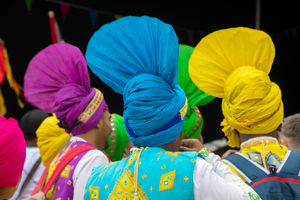 Colourful headgear at the International Eisteddfod. Photo: Mandy Jones