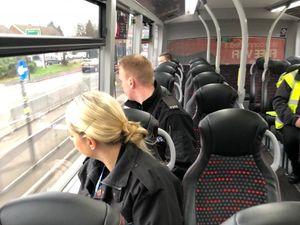 Supporting image for story: Police hiding on bus catch 19 drivers on the phone in 90 minutes