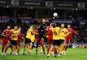 WOLVERHAMPTON, ENGLAND - MARCH 03: Jose Sa of Wolverhampton Wanderers punches the ball clear during the Premier League match between Wolverhampton Wanderers and Liverpool at Molineux on March 03, 2026 in Wolverhampton, England. (Photo by David Rogers/Getty Images)