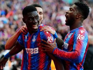 Crystal Palace’s Ismaila Sarr (left) celebrates scoring their third goal