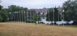 The flags of each competing nation and territory have been unfurled and raised in the village
