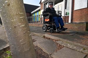 Barry Salter on the footpath next to Queen Street car park in Market Drayton that will be resurfaced