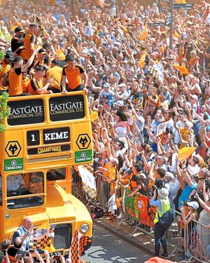 An open top bus pays tribute to Carl Ikeme 
