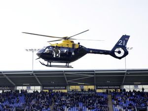 Supporting image for story: Helicopter lands on Shrewsbury Town pitch to make special delivery ahead of Crewe clash