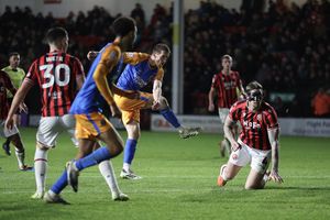 Tom Anderson of Shrewsbury Town scores a goal to make it 1-1.