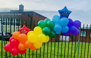 Bright balloons outside the school