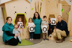 Canopy Nursery in Shrewsbury has been award a 'Good' Ofsted rating. Pictured are Lucy Barnes, Rachel Moelwyn-Williams and Dan Moelwyn-Williams with some of the children