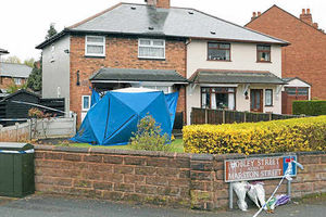 A police tent in the garden of Mr Davis' home in Hobley Street, Willenhall
