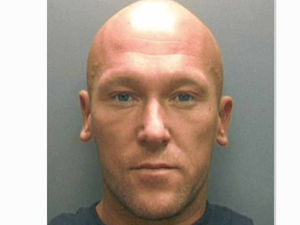 Supporting image for story: Robber jailed for fake gun raid
