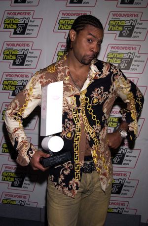 Shaggy poses with his award for Best Male Solo Artist, at the Smash Hits T4 Poll Winners Party at the London Arena in Docklands, Sunday December 9, 2001
