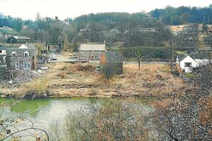There have been significant changes in this view of Jackfield since it was taken in 1986  and we dont just mean that the river is a lot higher at the moment. Paul France, who emailed it in, explains: The building in the middle used to be Jacky Harrisons bakehouse until he retired in the early 1950s. It was then purchased by Jackfield Band (for about £90!) and became their rehearsal room until the early 1980s when they moved to the Methodist Sunday Schoolroom, top left. They finally moved to their present headquarters, The Methodist Chapel, also top left , in 1996.  Today theres a new cottage, called The Tumbling Sailor, after the pub that used to be on the site, a two-car garage, and a large four-bedroomed house on the other side of the road. On the left of the photo, the wooden Sunday School room has been demolished.
