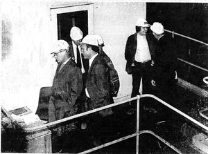 Rev William Lynn chats to a member of senior management
