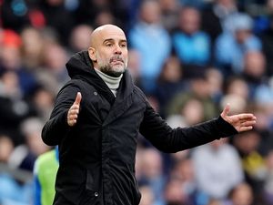 Manchester City manager Pep Guardiola gestures on the touchline