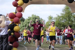 Our team start to cross the line, Paul and James 2 of the 6 completing all 85km