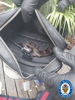Officers found a firearm, ammunition, and a zombie knife at the address. Photo: West Midlands Police