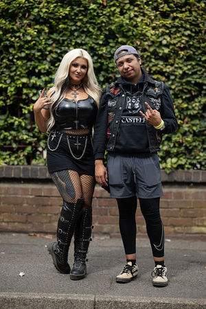 Music fans Harley Black (L) and Rudy Salazar (R) arrive to attend British rock band Black Sabbath's "Back to The Beginning" concert, Ozzy Osbourne's final ever gig as Black Sabbath's frontman at Villa Park in Birmingham, central England on July 5, 2025. Osbourne, who revealed in 2020 that he has Parkinson's disease, will join Tony Iommi, Geezer Butler and Bill Ward for the all-day "Back To The Beginning" show in Birmingham, central England, where the heavy metal giants formed in 1968. (Photo by Oli SCARFF / AFP) (Photo by OLI SCARFF/AFP via Getty Images)          