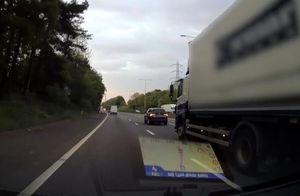 HGV closely following a car on the M5 in the West Midlands