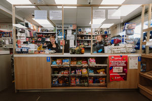 Sue Childs and Becky Tuner behind serving screens in Turners Top Shop, Bridgnorth