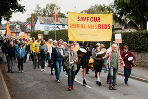 Campaigners and residents have marched in Bishop's Castle calling for health bosses to re-open inpatient beds at their hospital.