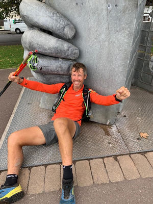 Kristian celebrates completing the challenge