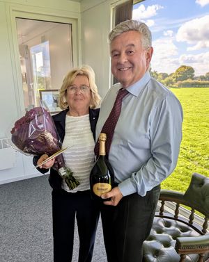 Dot Ryan was presented with gifts for her long service by James Leavesley, CEO of J T Leavesley Ltd, which owns Gulf Ivy Garage